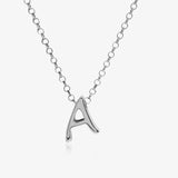Letter silhouette necklace.