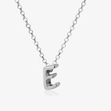 Letter silhouette necklace.