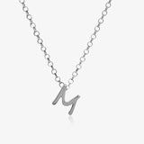 Letter silhouette necklace.