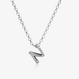 Letter silhouette necklace.