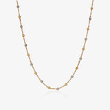 Collar Bolitas bicolor.