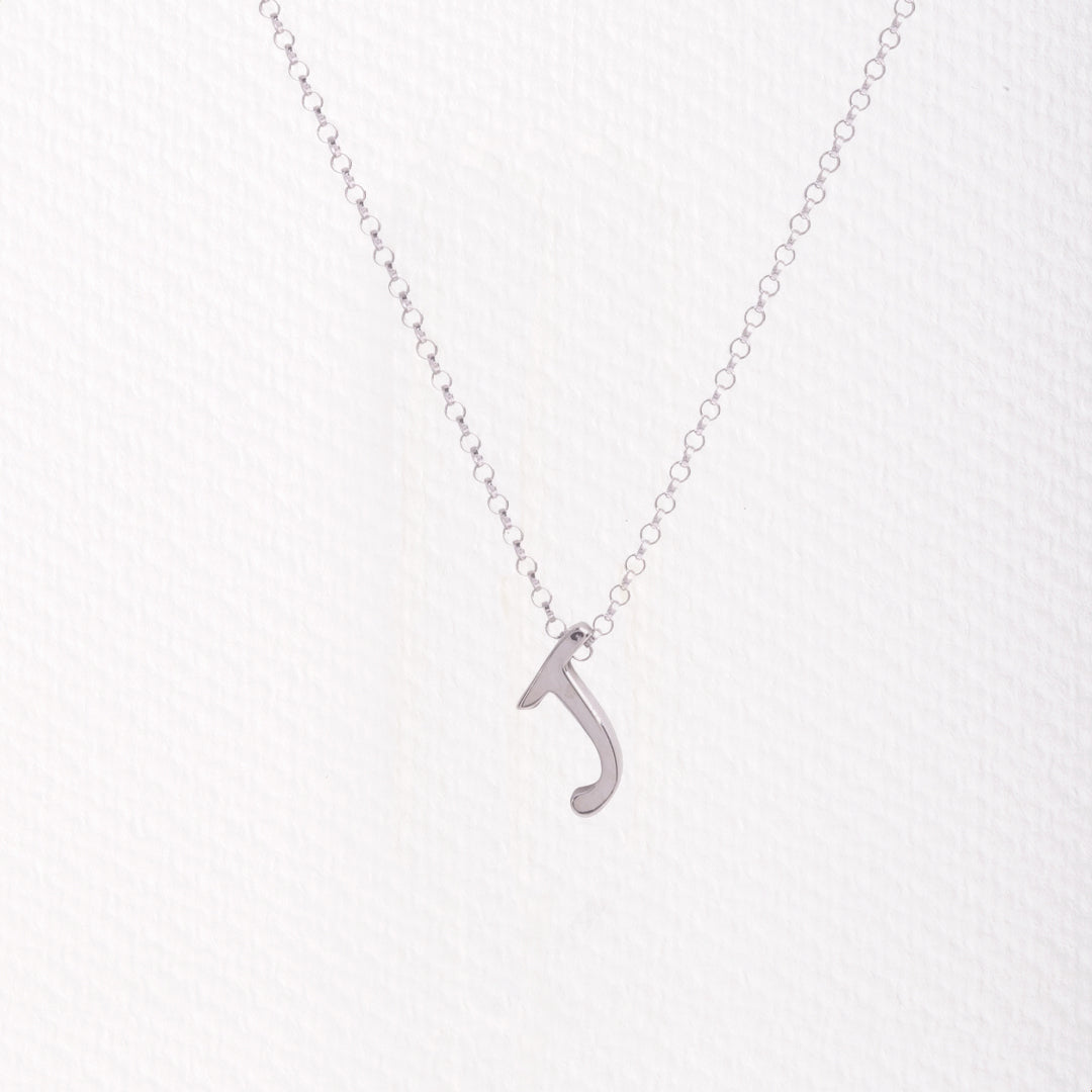 Letter silhouette necklace.