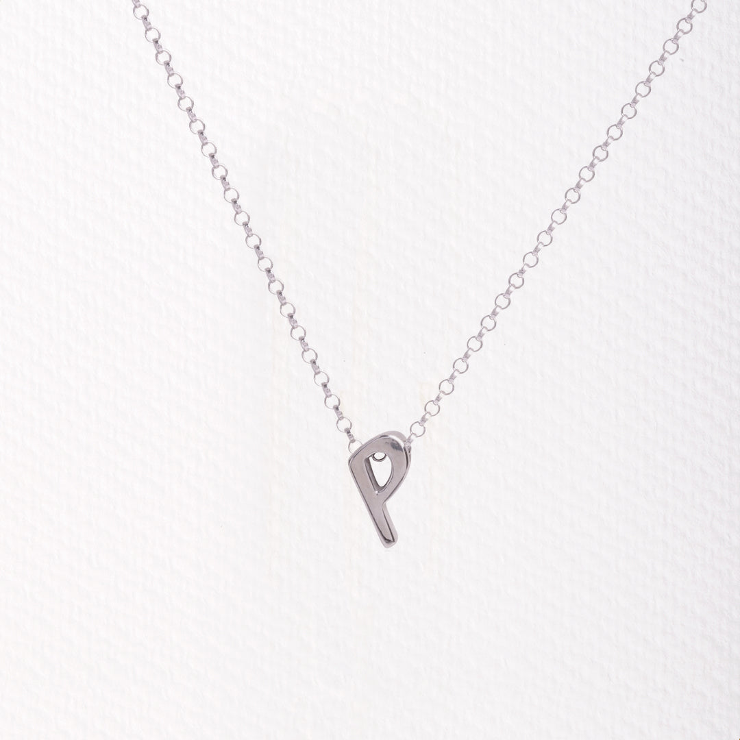 Letter silhouette necklace.