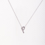 Letter silhouette necklace.