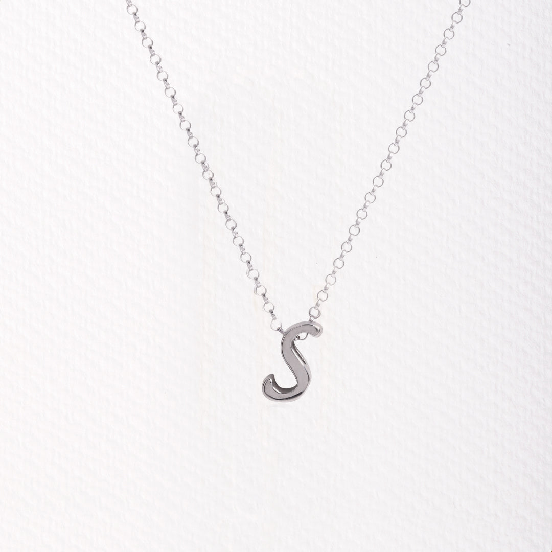 Letter silhouette necklace.