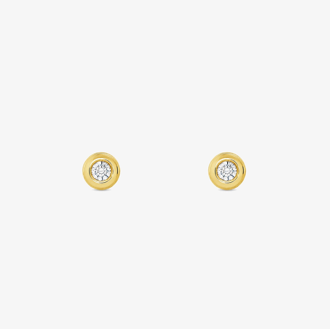 Diamond bezel stud earrings.